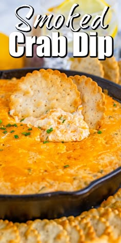 a bowl of smoked crab dip with crackers