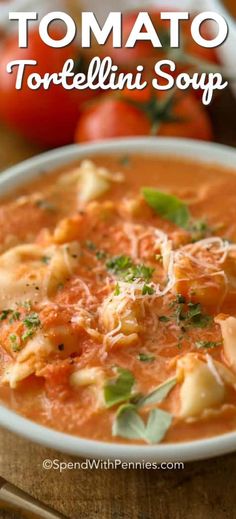 tomato tortellini soup in a white bowl