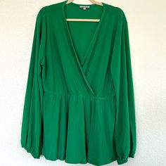 This Blouse Is A Kelly Green Color With An Empire/Babydoll Style Cut, A V-Cut Neckline And Puffed Sleeves. The Material Is A Polyester Spandex Blend With Good Stretch And It’s New Without Tags From A Boutique. It Measures About 22” From Underarm To Underarm And About 29” In Length. Babydoll Style, Cut Top, White Birch, Puffed Sleeves, Good Stretches, V Cut, V Cuts, Kelly Green, Green Color