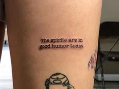 a woman's leg with a tattoo saying the spirits are in good humor today