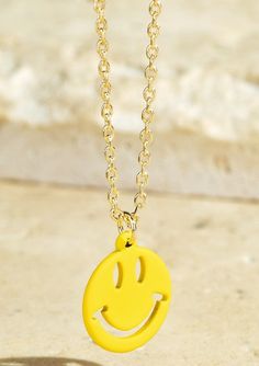 Spread cheer and happy vibes with the Yellow Smiley Face Necklace! Brass rubber coated smiley face charm Metal chain Lead compliant Approx L 16.25" Ext. 3" Imported Smily Face Necklaces Sliver Chain, Trendy Hypoallergenic Charm Necklaces, Casual Yellow Jewelry With Smiley Face, Smiley Face Necklace, Yellow Smiley Face, Face Necklace, Happy Vibes, Kids Jewelry, Smiley Face