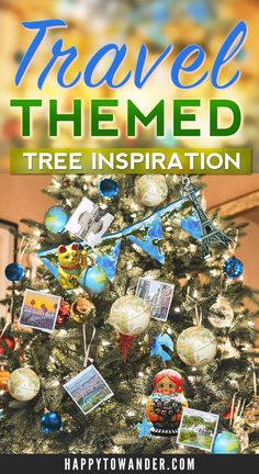 a christmas tree with pictures hanging from it and the text travel themed tree inspiration on top