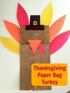 a paper bag with a turkey on it and the words thanksgiving paper bag turkey written in orange