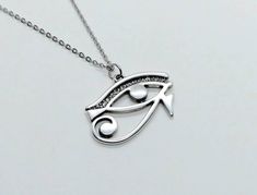 Silver necklace , Egyptian necklace , Eye of Ra , silver plated necklace , eye necklace , silver pendant , chain necklace , Eye of horus by PapadeliJewellery on Etsy Spiritual Stainless Steel Pendant Charm Necklace, Hypoallergenic Metal Pendant Necklace, Symbolic Stainless Steel Pendant Necklaces, Symbolic Stainless Steel Pendant Necklace, Nickel-free Stainless Steel Pendant Charm Necklace, Symbolic Hypoallergenic Stainless Steel Jewelry, Hypoallergenic Stainless Steel Pendant Charm Necklace, Symbolic Pendant Charm Necklace In Metal, Symbolic Metal Pendant Charm Necklaces