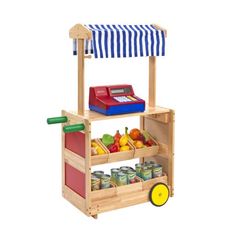 a wooden toy food cart filled with fruits and vegetables