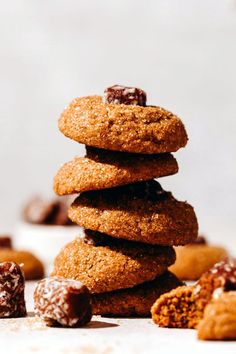 a stack of cookies sitting next to each other on top of a white countertop