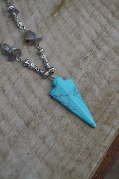 PLEASE read my shop announcement before placing an order so you know what to expect right now. Plus, when ordering from outside Europe, don't forget to provide a phone number for the courier to ensure the fastest and smoothest delivery. Beautiful bohemian / tribal turquoise arrowhead pendant necklace beaded with labradorite stones and tribal style findings. Necklace is about 18 inches, and fastens with lobster clasp, but you can have this in your desired length, just ask me. Turquoise, labradori Arrowhead Pendant Necklace, Blue Arrow, Beaded Boho Necklace, Elven Jewelry, Arrowhead Necklace, Book Character, Necklace Turquoise, Labradorite Beads, Necklace Blue