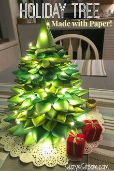 a christmas tree made with paper and lights