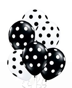 black and white balloons with polka dots on them