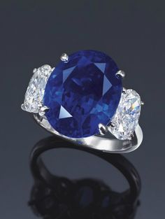 A SAPPHIRE AND DIAMOND RING, BY HARRY WINSTON Set ~ with a cushion-shaped sapphire weighing approximately 14.49 carats, Harry Winston Jewelry, Oval Cut Diamond Rings, Three Stone Ring, Diamond Anniversary Rings, Sapphire Diamond Ring, 925 Silver Jewelry