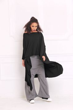 "Black Tunic Top, Asymmetric Tunic, Off Shoulder Top 🌟 Every order is sent out worldwide with EXPRESS 2-3 days delivery 🌟 Easily customizable Comfortable and the ideal gift idea Fitting every body type, suitable for every occasion Easily combined with accessories and other articles of clothing Adeptt Fashion is designed to flatter every body type and fit numerous occasions. We focus on the versatility of each model to make it a perfect match for your favorite accessories and wardrobe pieces! ? Flowy Long Sleeve Lagenlook Top, Flowy Lagenlook Long Sleeve Top, Chic Oversized Asymmetrical Blouse, Oversized Lagenlook Blouse For Fall, Oversized Blouse With Asymmetrical Hem For Layering, Oversized Asymmetrical Hem Blouse For Layering, Oversized Tunic Lagenlook Blouse, Flowy Long Sleeve Lagenlook Blouse, Lagenlook Flowy Long Sleeve Blouse