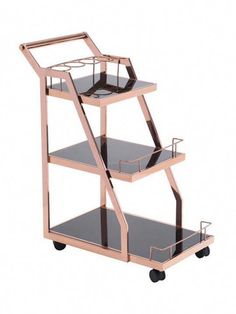 a three - tiered metal and glass trolley