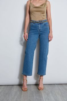 The "IT" Jean for Summer - we're obsessed with its effortless mid-rise silhouette & cropped wider leg. Crafted from our favorite Stretch Denim, these jeans will keep you comfortable and chic all day long - consider it a building block in your wardrobe. Elie Tahari Exclusive Wide Leg Stretch Denim Pant 80% Cotton, 12% Polyester, 7% Viscose, 1% Elastane Runs true to Size Measurements: Inseam 26"L, Front Rise 11"L (approx. length for size 6) Model is 5 '9 " and wearing size 2 Dry Clean Only Importe Rigid Denim Cropped Jeans With Belt Loops, Cropped Rigid Denim Jeans With Belt Loops, Relaxed Fit Cropped Jeans With Belt Loops, Cropped Denim Jeans With Five Pockets, Mid-rise Cropped Jeans In Medium Wash, Mid-rise Medium Wash Cropped Jeans With Belt Loops, Workwear Cropped Denim Jeans, Medium Wash Cropped Jeans With Five Pockets, Denim Blue Cropped Jeans For Work