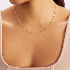 1- D E S C R I P T I O N The 14k Solid Gold Snake Chain Necklace is a luxurious and stylish piece of jewelry that is perfect for those who love dainty gold chain and minimalist necklaces. This necklace is crafted with genuine 14K gold and features a beautiful snake chain design that adds a touch of elegance to any outfit. Whether you prefer to wear it on its own or layer it with other necklaces, this versatile and minimalist necklace is perfect for any occasion. As a real gold jewelry, it is als Formal Classic Snake Chain Necklace, Yellow Gold Delicate Snake Chain Necklace For Everyday, Delicate Yellow Gold Snake Chain Necklace For Everyday, Everyday Yellow Gold Adjustable Snake Chain Necklace, Everyday Yellow Gold Delicate Snake Chain Necklace, Classic Yellow Gold Delicate Snake Chain Necklace, Classic Yellow Gold Herringbone Necklace With Clavicle Chain, Minimalist Snake Chain Necklace For Formal Occasions, Modern Gold Chain Necklace For Everyday