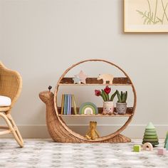 a wicker shelf with books and toys on it