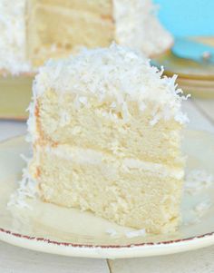 a slice of coconut cake on a plate