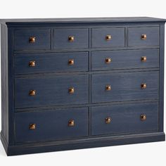 a dark blue dresser with gold knobs on the top and bottom drawers, against a white background