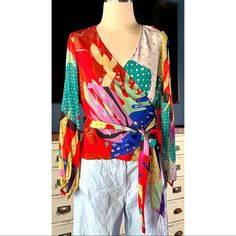 New With Tags Size Xs This Gorgeous Blouse By Conditions Apply Has A Vibrant Colorful Abstract Pattern. The Top Is A Traditional Wrap Style And Ties At The Waist. It Has A V-Neck & Long Sleeves. *This Fabric Wrinkles Very Easily. It Will Arrive Wrinkled. Measurements Laying Flat: Length 21.5” Bust 17.5” Waist 16” Sleeve 22”5” Silk Tops With Vibrant Print And Long Sleeves, Multicolor Silk Top With Vibrant Print, Multicolor Silk Tops With Vibrant Print, Fitted Multicolor Top For Brunch, Multicolor Silk V-neck Top, Casual Silk Tops With Vibrant Print, Fitted Multicolor Silk Tops, Fitted V-neck Blouse With Vibrant Print, Spring Silk Wrap Blouse