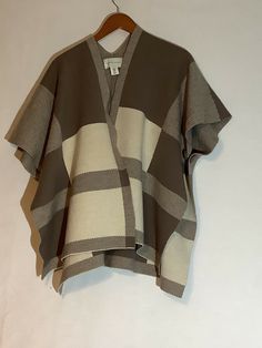 Adrienne vittadini women’s wool poncho winter wear chal size M🌸. Great condition,please see pictures for more details minor signs of wear Measurements length 27” Pit to pit 34” Sleeve open10.5” Thank you for looking Beige Wool Poncho One Size, One Size Beige Wool Poncho, Oversized Brown Wool Poncho, Beige One Size Wool Outerwear, Casual Wool Poncho, Casual Wool Poncho One Size, Casual One-size-fits-all Wool Poncho, Wear Shawl, Poncho Winter