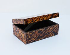 an animal print box is open on the table