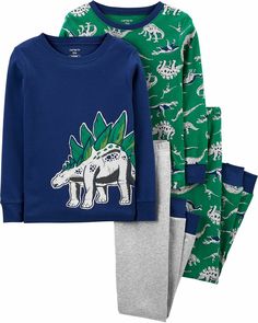 Your Dinosaur fan will be sure to love the fun dino-themed graphic and print along with the comfort of the soft cotton fabric. One set features a cool and dimensional Stegosaurus applique while the other features an all-over print. Coordinating pajama pants with royal blue cuffs. Elasticized waistbands for a custom fit. Of a soft and cozy cotton fabric, to be worn snug-fitting.   Paypal Payments Accepted.   All purchases are mailed out within 2 business days of receipt of payment. Carters Size Chart, Affordable Clothing Websites, Cotton Pajama Set, Cotton Pjs, Carter Kids, Boys Graphic Tee, Cotton Pajama Sets, Boys Pajamas, Cotton Pyjamas