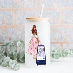 a white canister with a drawing of a girl holding a cell phone on it