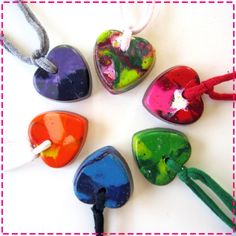 four heart shaped glass pendants on a string