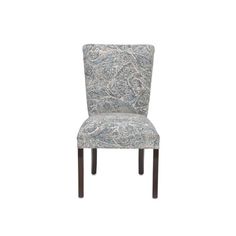 an upholstered chair with paisley fabric on the back and legs, against a white background