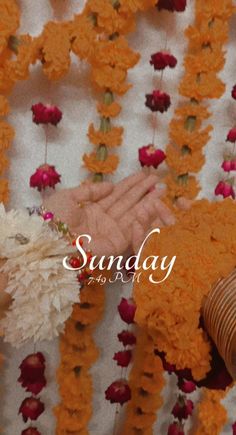 an image of a woman holding flowers in her hand with the words sunday on it