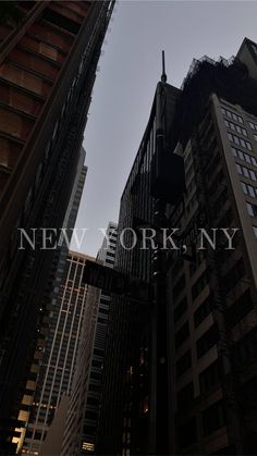 looking up at skyscrapers in new york city