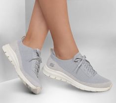 Get right to the sporty style and comfort wearing Skechers Pure Flex - Pulse. This slip-on sneaker features a Stretch Fit engineered knit upper with a fixed lace front and a cushioned Skechers Air-Cooled Memory Foam insole. | Skechers Women's Pure Flex - Pulse Sneaker | Medium Width | Skechers Air-Cooled Memory Foam cushioned comfort footbed | Stretch Fit design for sock-like comfort | Crafted with 100% vegan materials | Engineered knit upper with fixed laces | Flexible traction outsole | Machin Slip-on Sneakers With Elastic Laces For Light Sports, Lace-up Walking Shoes With Arch Support For Light Exercise, Sporty Breathable Sneakers With Easy Fit, Walking Shoes With Elastic Laces For Light Exercise, Comfortable Lace-up Sneakers For Light Exercise, Comfortable Low-top Sneakers With Arch Support, Low-top Comfortable Sneakers With Arch Support, Comfortable Fit Low-top Sneakers With Arch Support, Low-top Sneakers With Arch Support And Comfortable Fit