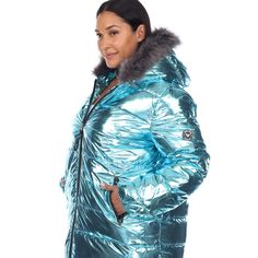 Zipper in the warmth in this eye-catching metallic puffer jacket, an oversized pick designed with a super cozy material that features front zipper closure, hoodie and two front zip pockets. This on-trend design shines with timeless urban style. Features: material 100 percent Polyester, Metallic jacket, zipper closure and 2 front zip pockets. Casual Hooded Metallic Outerwear, Metallic Long Sleeve Outerwear With Zipper, Trendy Hooded Puffer Jacket With Faux Fur Lining, Shiny Long Sleeve Winter Outerwear, Metallic Winter Outerwear For Streetwear, Metallic Outerwear For Winter Streetwear, Metallic Winter Streetwear Outerwear, Metallic Hooded Winter Outerwear, Metallic Puffer Jacket