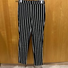 New With Tags. Ankle Length Work Pants From Forever 21. Color Black And White Stripes. Size Small. Never Worn! Forever 21 High Waist Work Pants, Forever 21 High Waist Pants For Work, Forever 21 Fitted Pants For Workwear, Forever 21 High-waisted Stretch Pants, Forever 21 Stretch High-waisted Pants, Forever 21 Black Bottoms For Workwear, Forever 21 High Waist Black Pants, Forever 21 Summer Workwear Pants, Forever 21 Stretch Black Pants