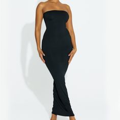 Brand New Maxi Tube Dress. Material Is 88% Polyester, 12% Spandex. Sleek Stretch Maxi Dress For Date Night, Fitted Seamless Maxi Dress For Night Out, Seamless Stretch Dress For Date Night, Stretch Maxi Dress For Night Out With Flattering Silhouette, Seamless Maxi Dress For Night Out, Seamless Dresses For Night Out, Black Sleeveless Smoothing Dress, Black Bodycon Strapless Maxi Dress, Black Stretch Seamless Midi Dress