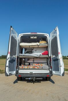 the back end of a van with its doors open