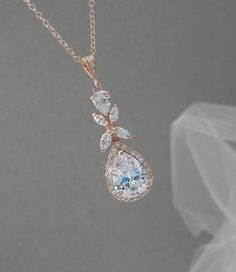 Dazzling Crystal Dangle Necklaces, Sparkling Crystal Pendant Jewelry, Sparkling Teardrop Pendant Jewelry For Party, Dazzling Drop Bridal Necklace Gift, Sparkling Drop Bridal Necklace, Sparkling Pendant Jewelry For Wedding, Dazzling Crystal Drop Necklaces, Dazzling Crystal Drop Necklace, Dazzling Crystal Teardrop Pendant Jewelry