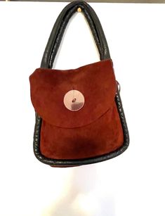 "Vtg 60s 70s brown sueded leather artist bohemian purse /shoulder bag with soft black leather piping trim and a Xlarge lucite button for a closure Very good condition  Measures: 13\" high, 14\" wide, 4\" depth, 22\" around handles Annie SAYS Check out my other listing for more great things! Usps priority domestic shipping  Please read all my store policies and email me with any questions. Thanks for shopping at antique! Always from a smoke-free, good energy environment!" 70s Artists, Leather Artist, Bohemian Purse, Good Energy, Leather Purse, Soft Black, Leather Purses, Piping, Purses And Handbags