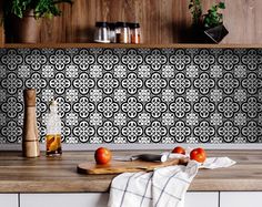 the kitchen counter is clean and ready to be used as a cutting board for apples