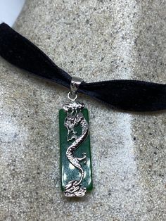 Vintage Green Jade Choker Silver Finish necklace pendant All green color enhanced Jade set in an ornate silver White bronze frame. Over 1 in long All jewelry is shipped in a nice gift box. Check out our over a THOUSAND great reviews Vintage Green Rectangular Necklace, Green Rectangular Spiritual Jewelry, Spiritual Green Necklace With Rectangular Pendant, Spiritual Green Rectangular Jewelry, Engraved Jade Necklaces For Gifts, Engraved Jade Necklace Gift, Gift Engraved Jade Necklaces, Engraved Jade Necklace For Gift, Formal Green Engraved Necklace