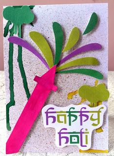 a card with an image of a plant and the words happy holi on it