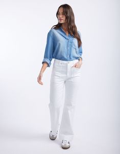 DESCRIPTION Elevate your everyday look with the Ava Vintage Shirt in Denim by White & Co. This essential Spring wardrobe staple offers a relaxed fit and a vintage wash, giving you that effortless yet stylish look. The soft, lightweight blue denim pairs perfectly with its button-down front, chest pocket, and subtle fading for a lived-in look. Team this shirt with your favourite white jeans for a fresh, on-trend outfit. Whether you're grabbing brunch with friends or jetting off on a holiday, the A Casual Dark Wash Tencel Jeans, Casual Denim Blue Tencel Jeans, Casual White Cotton Denim Top, Casual Button-up Relaxed Fit Jeans, Spring Washed Button-up Jeans, Cotton Denim Top With Frayed Hem And Relaxed Fit, Casual Button-up Jeans For Everyday, Casual Relaxed Fit Denim Top Made Of Tencel, Everyday Medium Wash Button-up Jeans