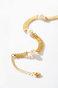 Adorn your wrist with a luxurious blend of woven gold strands and lustrous pearls, offering versatility and sophistication for every wearer. Amazon Jewelry, Cultured Pearls, Pearl Bracelet, Freshwater Pearls, Timeless Elegance, Gold Plate, Bracelet, Chain, Gold