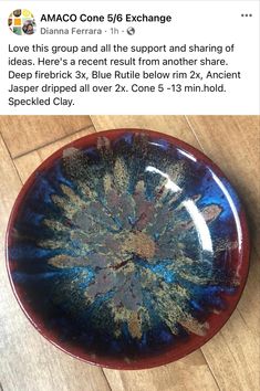 a red and blue plate sitting on top of a wooden floor