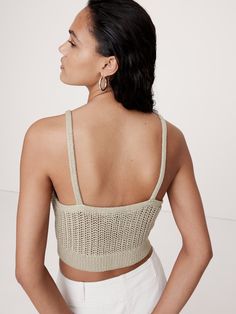 This cropped sweater is knitted using an open, mesh-like stitch in our chunky, mercerized cotton yarn—a special process that produces a smoother, silkier handfeel with a signature luster.  Fitted.  Organic: Made with certified, organically grown cotton that's easier on the earth.  V-neck.  Straight hem.  *This style is unlined.  Fitted.  Sleeveless.  Cropped length.  Model: Size S, 5'10" (178cm). Mercerized Cotton Yarn, Cropped Sweater, Crop Tank, Summer Sale, Cotton Yarn, First Look, The Earth, Banana Republic, Cashmere