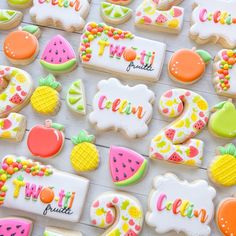 some decorated cookies are laying on a table