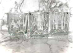 three shot glasses sitting on top of a marble counter with the words, the walison family