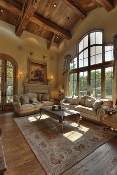 a large living room with lots of windows and furniture