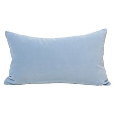 a light blue pillow on a white background