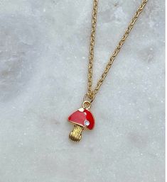 This adorable mushroom necklace comes in a beautiful red colour with a dainty gold chain. This necklace is super trendy. Pair with other jewelry from our shop for a Y2K look! Dainty Gold Chain, Mushroom Necklace, Red Mushroom, Red Colour, 2 People, Gold Chain, Gold Chains, Red Color, Charm Necklace