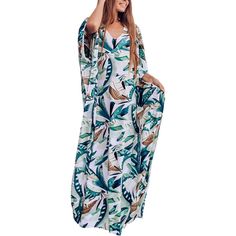 The Beach Printed Kaftan Dress For Women's Short Sleeve Suit Cover Ups is a beautiful and unique piece that has been hand-dyed using the traditional Indonesian technique. The dress is perfect for adding a touch of trendiness to your vacation. It can be worn as a stylish beach cover-up for your swimsuit or as a glamorous evening gown, transitioning seamlessly from day to night. The fabric has a loose, flowing fit that is both fashionable and comfortable. Made from soft, breathable fabric, it is c Vacation Tunic Dresses Printed, Vacation Tunic Dress With Prints, Green Floral Print Maxi Dress For Vacation, Green V-neck Boho Dress For Vacation, Green Printed Summer Maxi Dress, Bohemian Green Maxi Dress For Beach Season, Green Flowy Maxi Length Cover-up, Green Bohemian Dress With Tropical Print, Flowy Green Maxi Length Cover-up